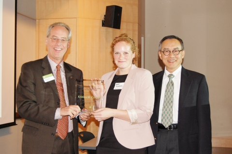 Kristina Currans, center, accepts the Denice Dee Denton Women Engineers Hall of Fame award from Portland State University President Wim Wiewel, left, and Dean Renjeng Su.