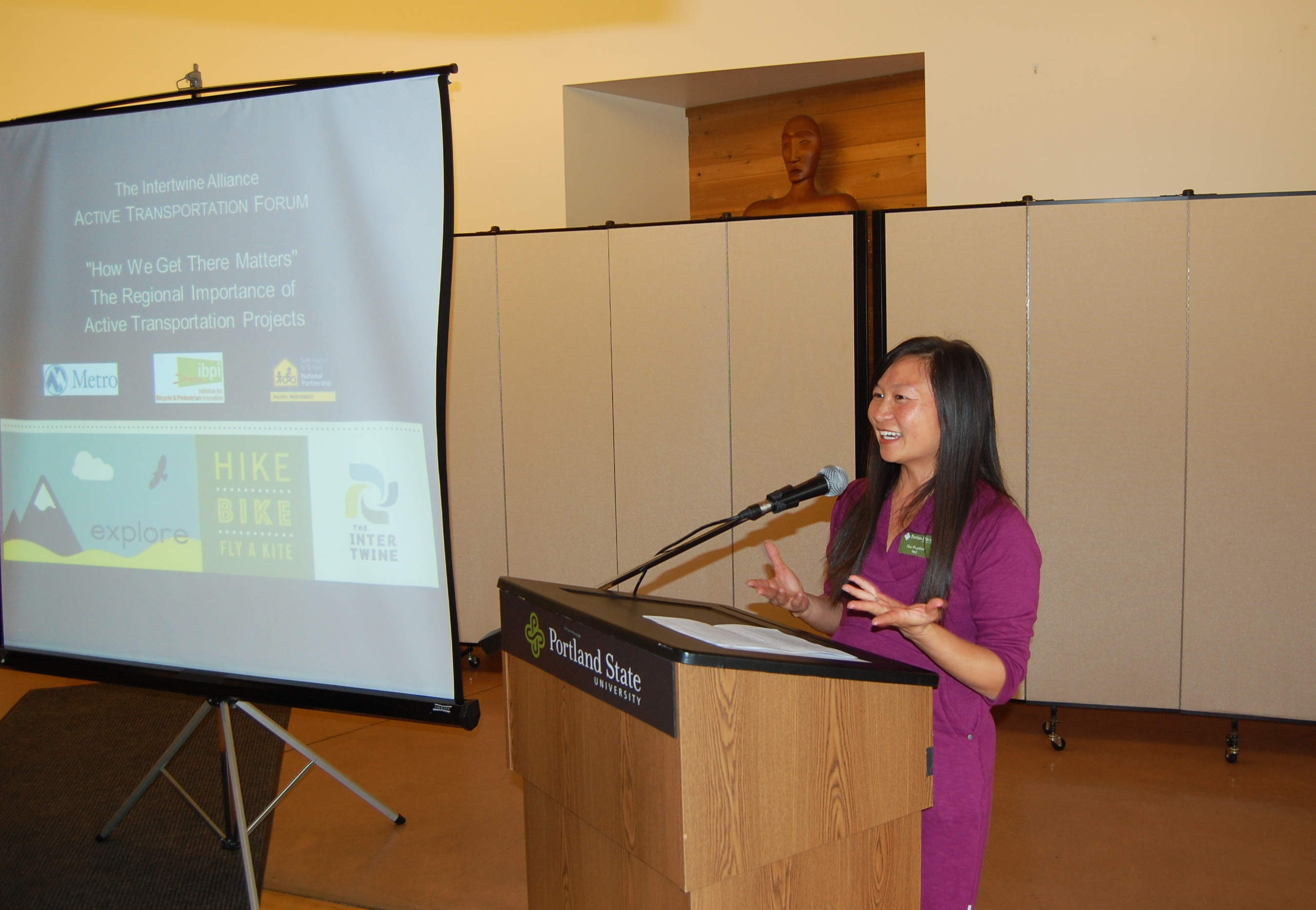 Hau Hagedorn of TREC welcomes participants to the "How We Get There Matters" forum Jan. 27.