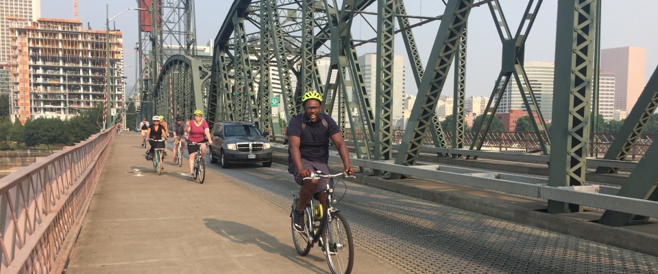 Cyclists ride on the Hawthorne Bridge