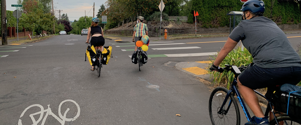 Cyclists ride along a bicycle boulevard in Portland, Oregon