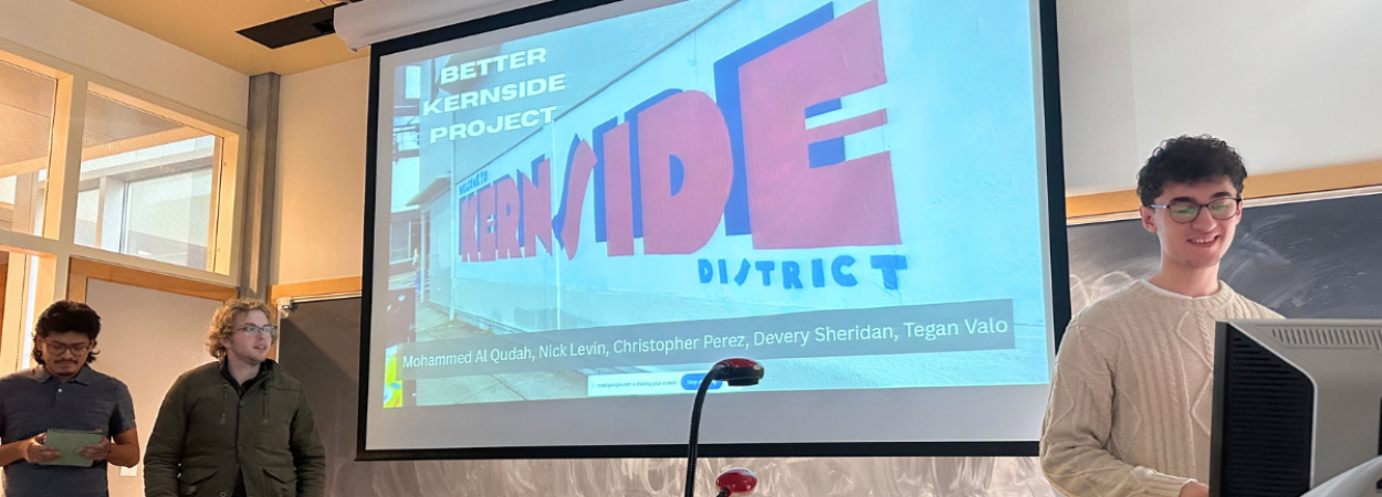 Students in the Active Transportation Planning-Design Studio present their projects in a classroom