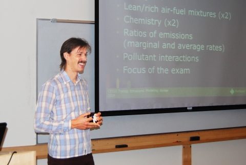 Portland State doctoral student and former OTREC Student of the Year Alex Bigazzi lectures during his Transportation Emissions Modeling course Feb. 6. Bigazzi developed the course to give engineering students experience with industry-standard models.