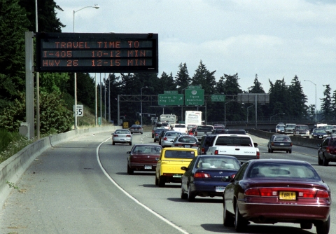 This variable message sign on OR 217 indicates drive times to upcoming junctions.