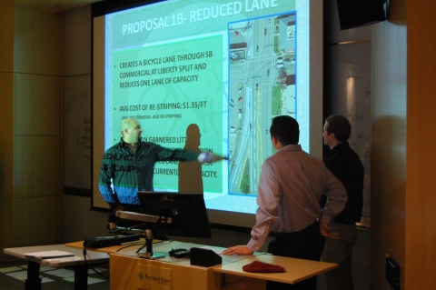 Portland State students Michael Hodge, John Sullivan and Jason Brock present bicyle options for downtown Salem for the urban transportation systems class.