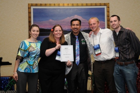 Oregon State ITE student chapter members receive the student chapter award from ITE Western District President Edgar Perez at the district's annual meeting in Anchorage, Alaska. From left: Ioana Cosma, Lacy Brown, Perez, Jon Mueller and Halston Tuss.